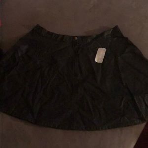One button faux leather skirt